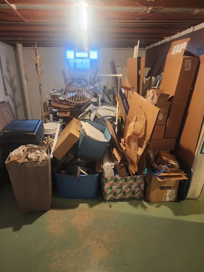 Roll-off dumpster container at job site for 4 Yard Dumpster Rental in Plainville